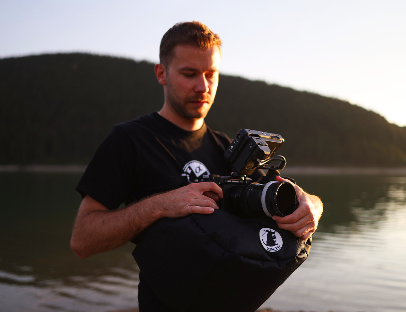 Customizable Professional Steady bag (Steady Saddle) Cinematographer holding a bag on his neck with a professional camera on top of the bag