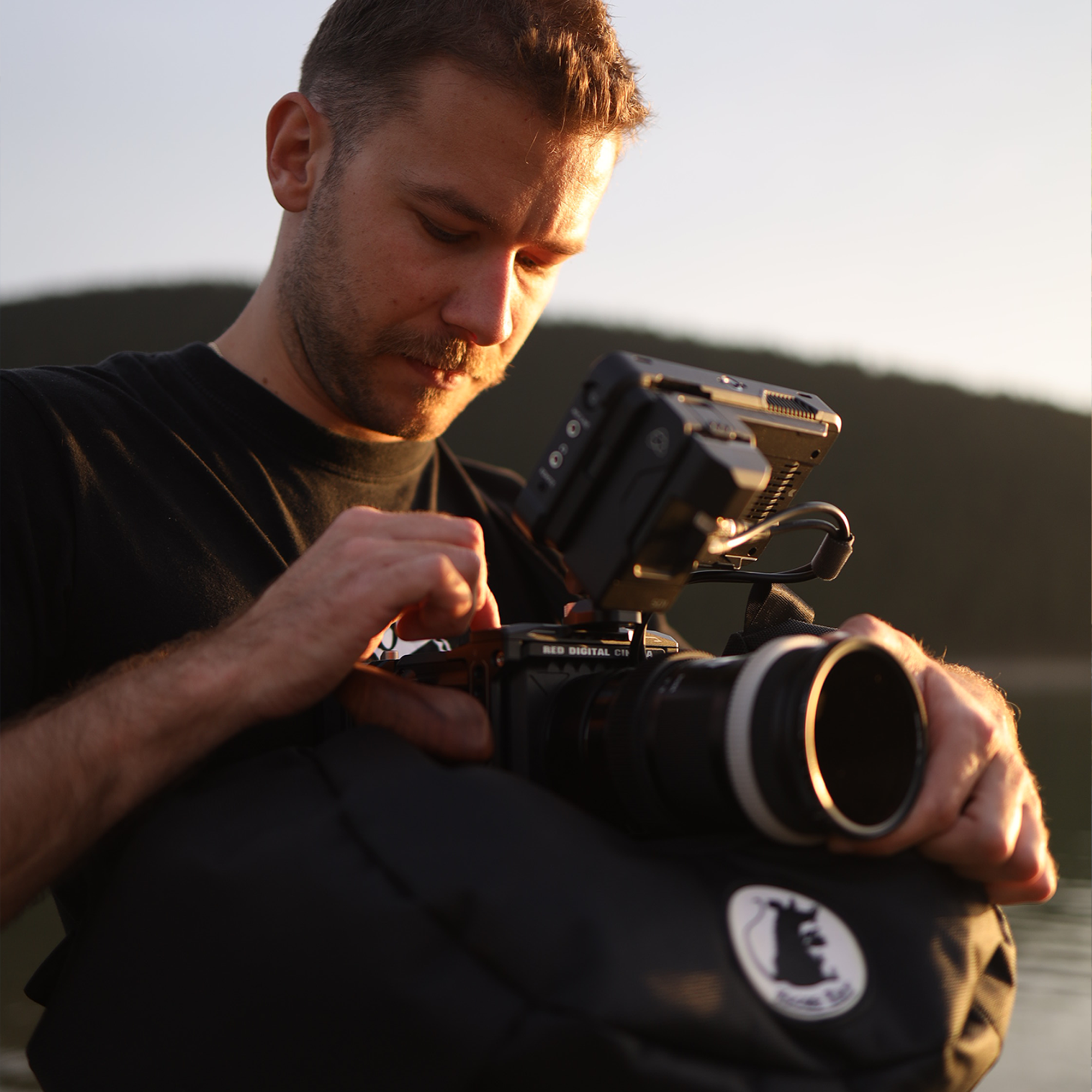 Cine Saddle like Steady Bag Medium in use by a cinematographer