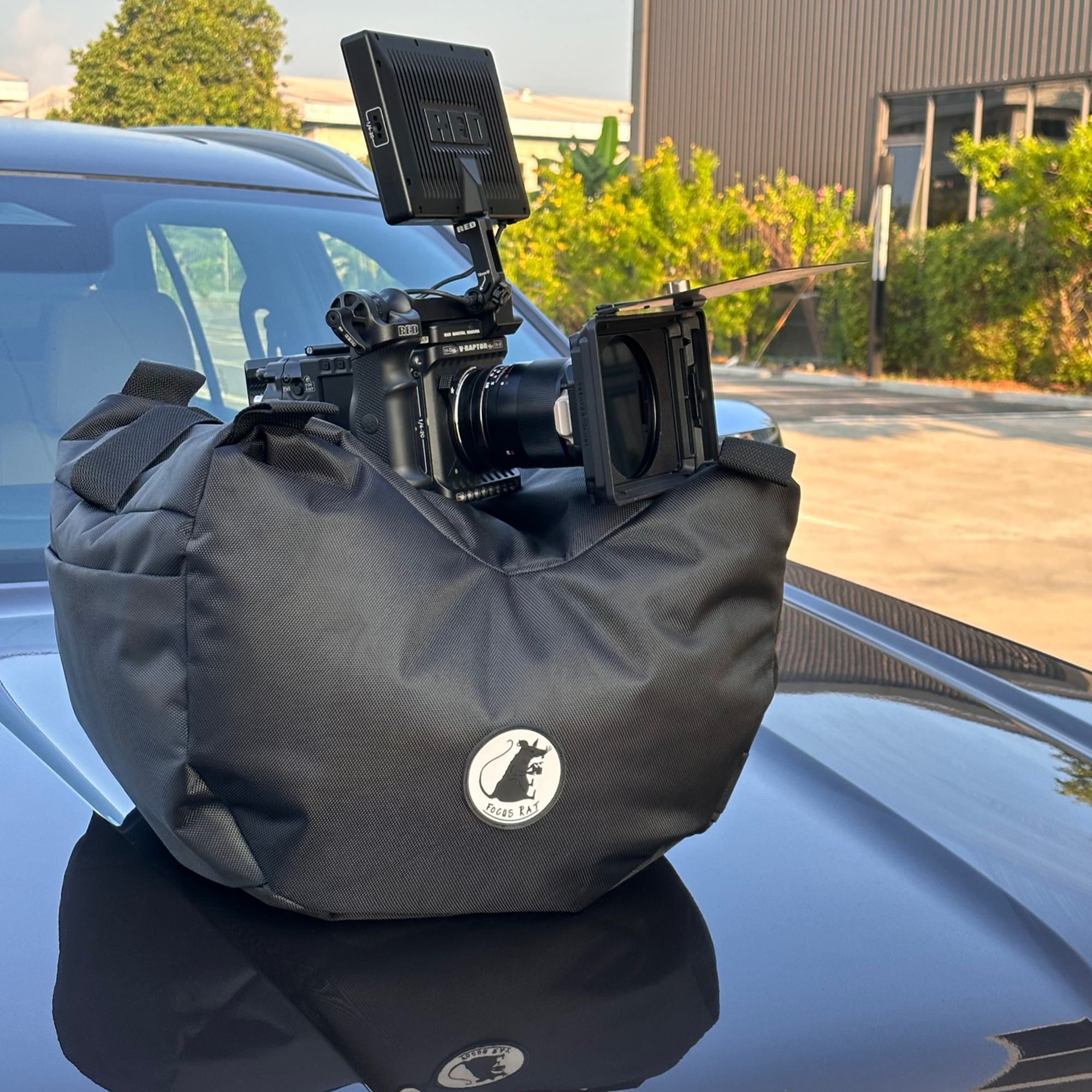 Cine Saddle like Steady Bag Large In Use with a Red Camera on a car